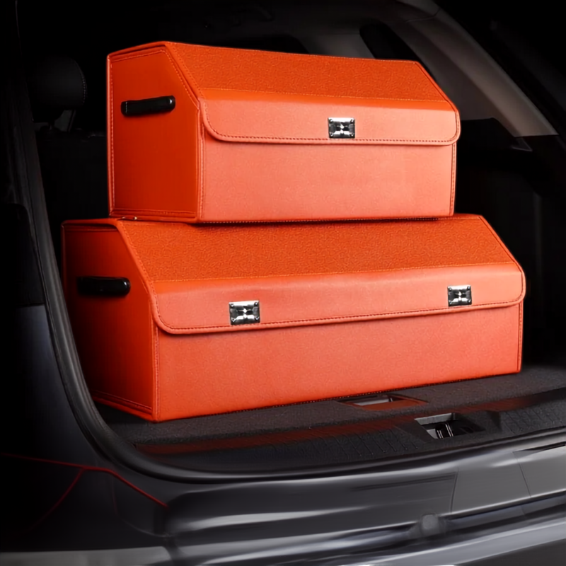 Leather Car Trunk Organizer – Large Capacity Foldable Storage Box Two bright orange car trunk organizer boxes stacked inside a dark car trunk.