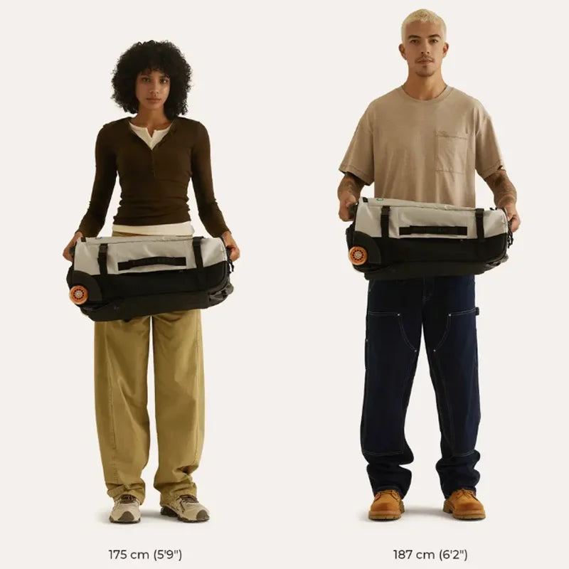 Wheeled Travel Backpack – Large Capacity Carry-On Two people holding large bags, with measurements indicated on a white background