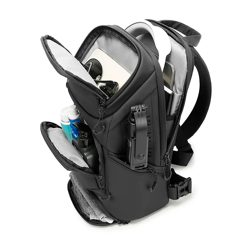 Waterproof Sling Chest Bag – Multi-Pocket Outdoor Crossbody Bag A black BANGE camera backpack shown open, filled with gear and accessories, on a white background.