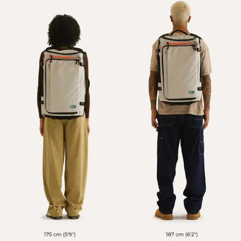 Wheeled Travel Backpack – Large Capacity Carry-On Two people wearing a beige backpack from different angles on a white background