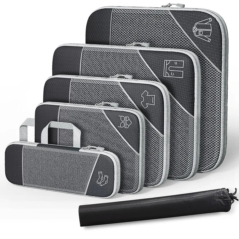Compression Packing Cubes Set with Shoe Bag – Travel Luggage Organizers Set of gray packing cubes with zippers on a white background
