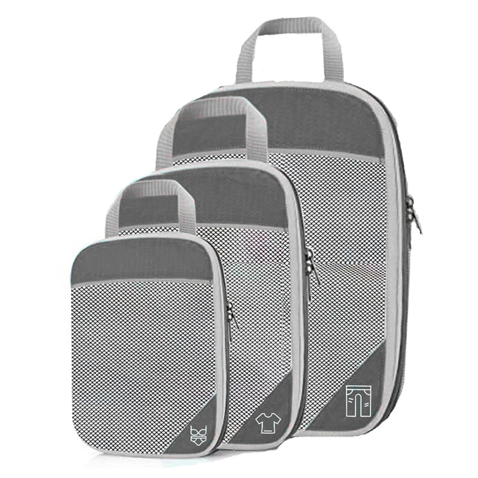 Compression Packing Cubes Set with Shoe Bag – Travel Luggage Organizers Set of three gray packing cubes with handles on a white background