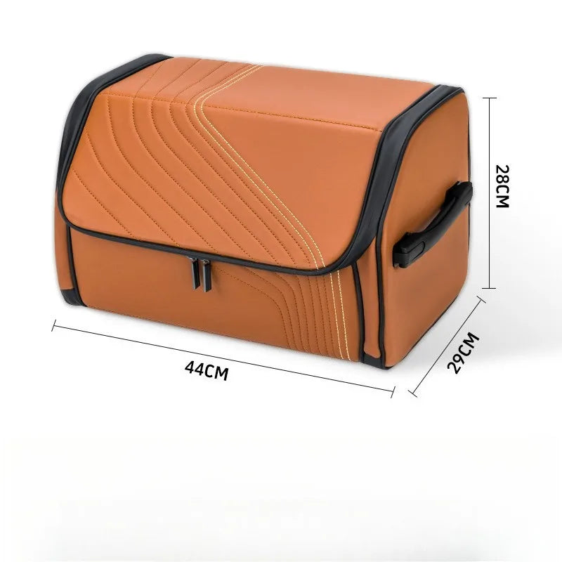 Luxury Leather Car Trunk Organizer – Large Foldable Storage Box An orange-brown zippered storage bag with black trim and handles, shown on a white background with dimension lines indicating 44cm length, 29cm width, and 28cm height.