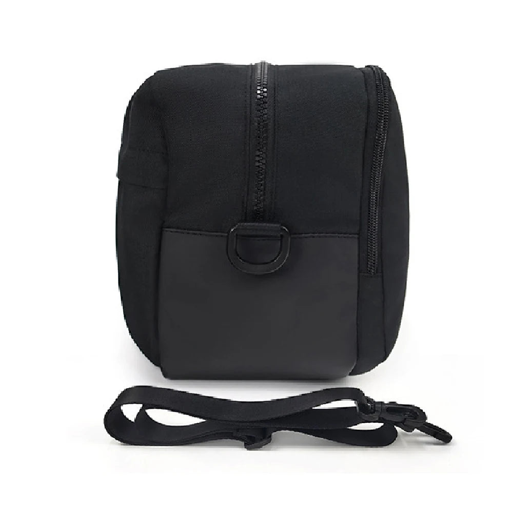 Travel Shoe Pouch – Portable Shoe Organizer for Gym & Sports A black cylindrical camera bag with a front zipper, a black D-ring closure, and an attached black shoulder strap, shown on a plain white background.