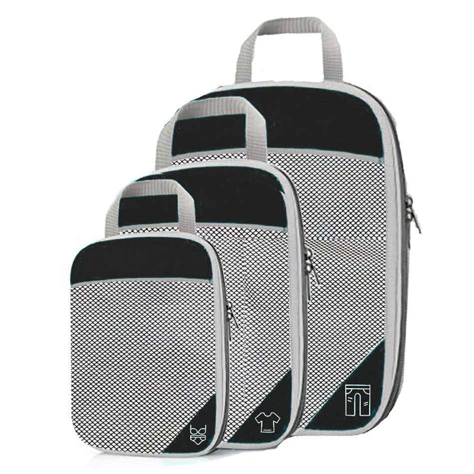 Compression Packing Cubes Set with Shoe Bag – Travel Luggage Organizers Set of three gray packing cubes with black accents on a white background