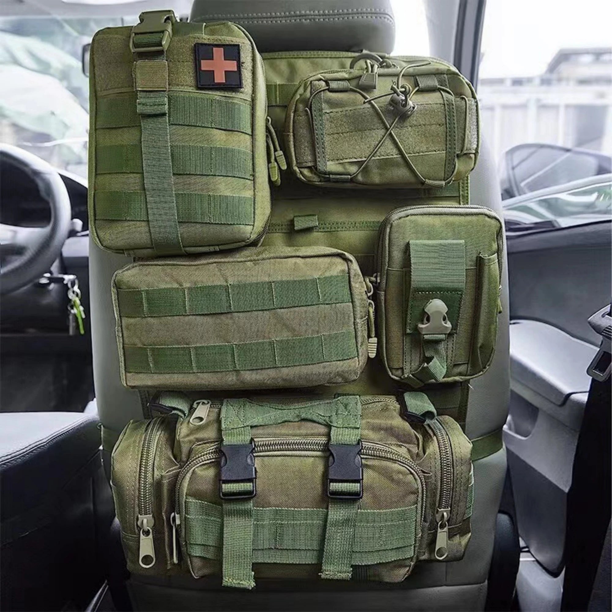 Car Backseat Organizer – Hanging Tactical Storage Bag Stack of green tactical pouches on a car seat