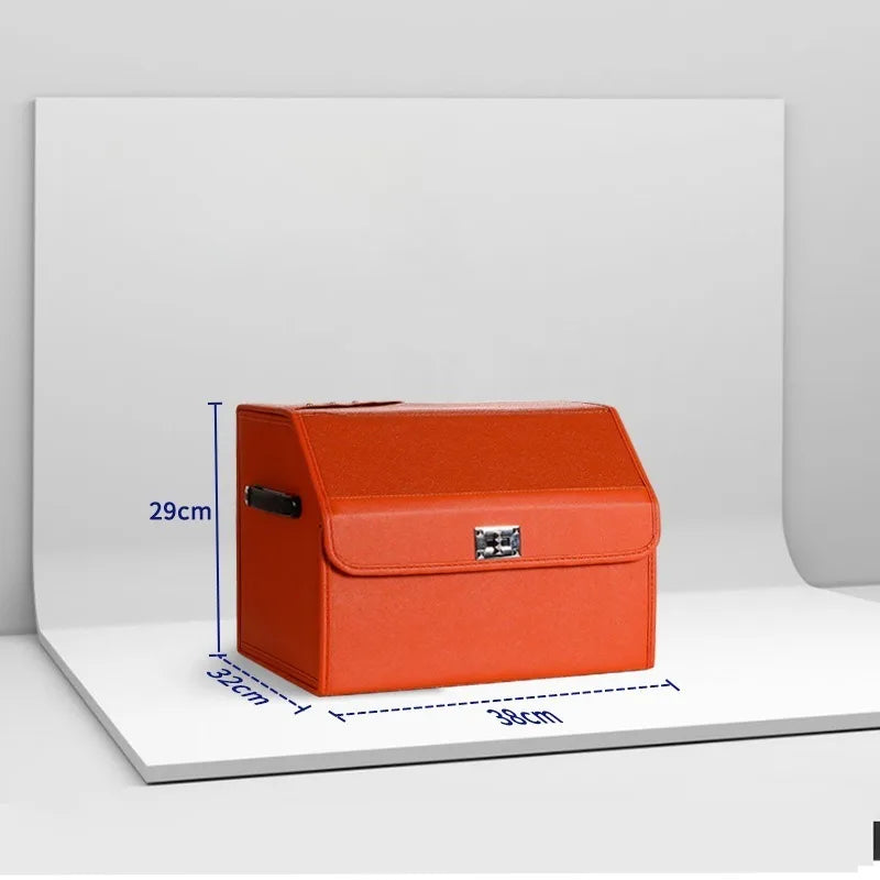 Leather Car Trunk Organizer – Large Capacity Foldable Storage Box An orange faux-leather storage box with a hinged front flap and silver metal latch, shown on a white display board with blue dimension lines indicating 29cm height, 32cm width, and 39cm depth.