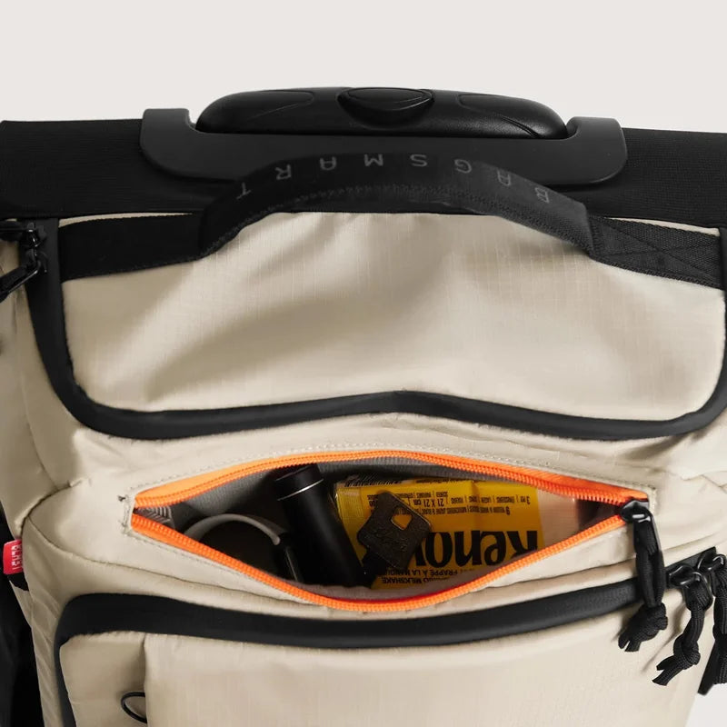 Wheeled Travel Backpack – Large Capacity Carry-On Beige bag with black handle and orange zipper pocket on a white background