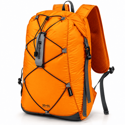 An orange hiking backpack with black compression straps and gray accents, shown on a clean white background. The brand 'Hikeman' is visible on the front strap.