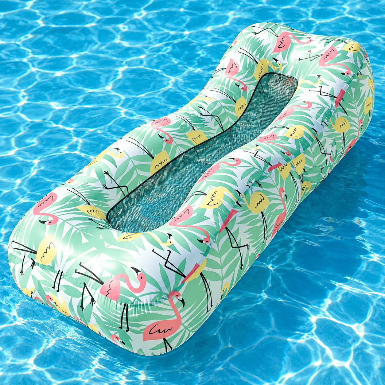 An inflatable pool float with a tropical flamingo print, floating on clear blue swimming pool water.