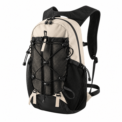 A dual-tone hiking backpack in beige and black, featuring a front mesh pocket with crisscross compression straps, side mesh pockets, and padded shoulder straps, shown on a plain white background.