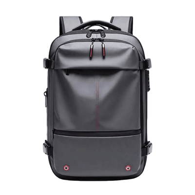 A dark gray backpack with black straps and trim, featuring a vertical red stitched line on the front pocket and small red accents near the bottom corners, shown against a plain white background.