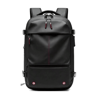 A black backpack with a matte finish, featuring a vertical red stitched line down the center, dual zipper pulls with red and white accents, and two small red circular logo details on the lower front pocket.