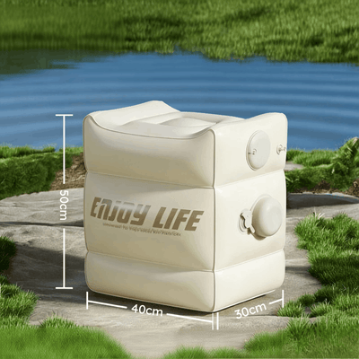 An outdoor poolside lounge chair shown on a stone patio with grass and water in the background. White dimension lines and text indicate measurements of 50cm height, 40cm width, and 30cm depth.