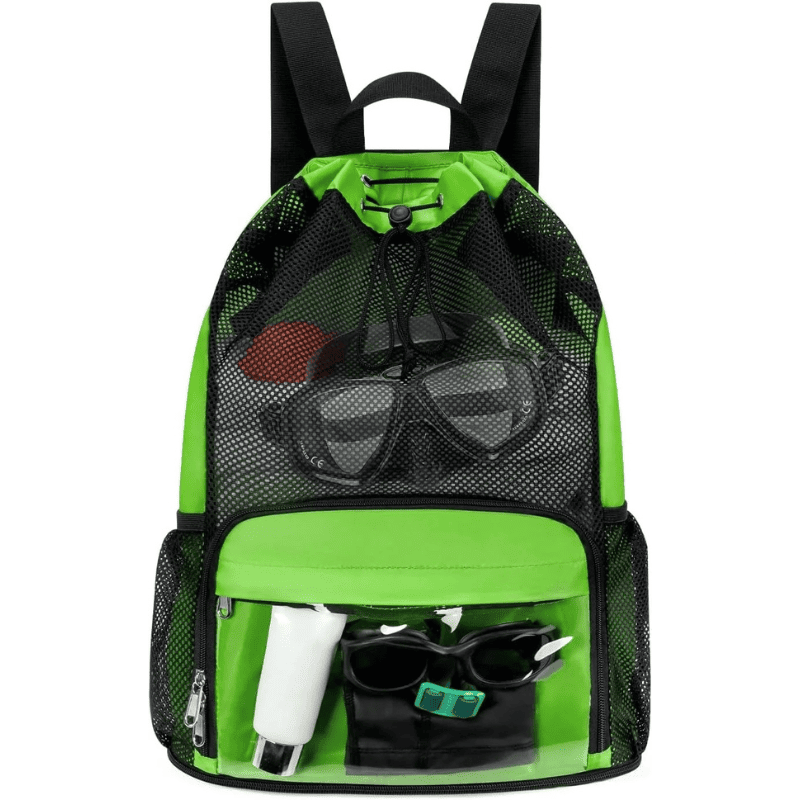 A bright green and black mesh drawstring backpack shown against a plain white background, filled with travel accessories like sunglasses, a tube, and a small bottle.