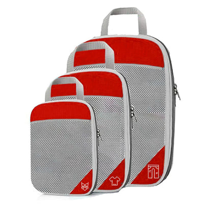 Set of red and gray packing cubes on a white background