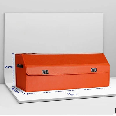 An orange fabric storage box with metal clasps, shown on a white platform with dimension lines indicating 31cm width, 29cm height, and 75cm depth.