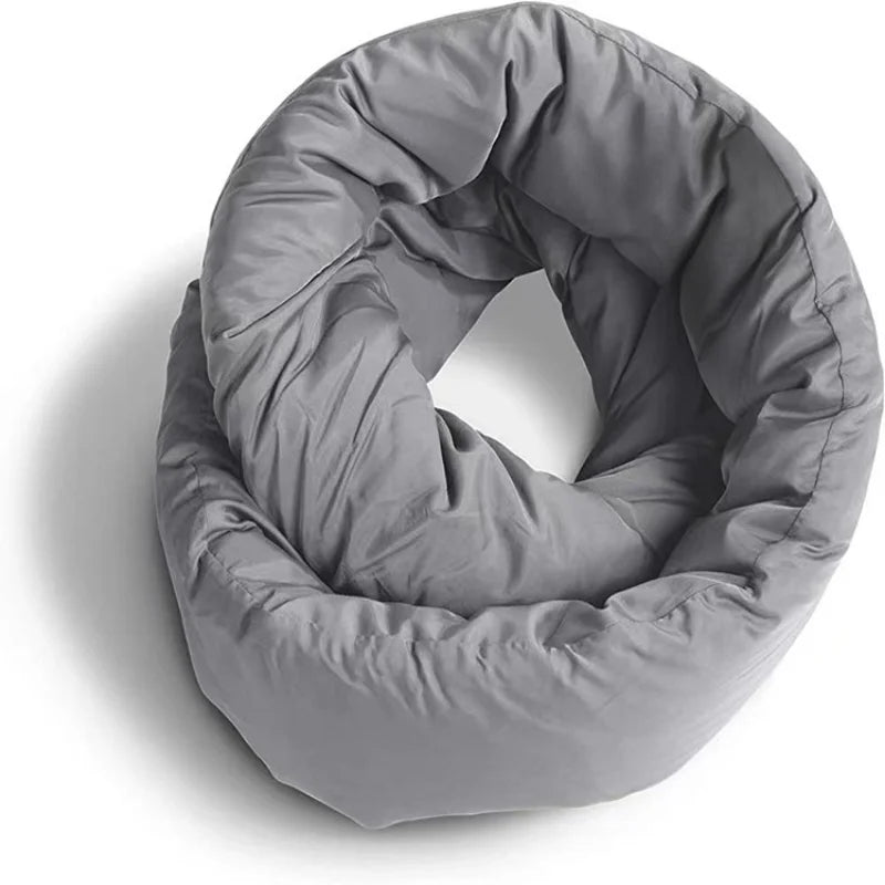 A plush, circular bean bag chair in a deep burgundy red color, photographed from a top-down angle on a clean white background.