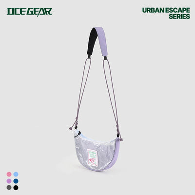 A semi-circular shoulder bag from Ice Gear in a translucent lavender and silver colorway, featuring a black-and-lavender padded top handle and a thin matching shoulder strap. The bag has a small green and pink graphic label on the front.