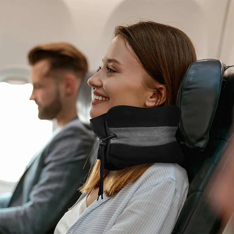 Gray and black neck pillow with drawstring bag on a white background