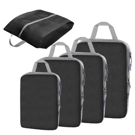 Four black packing cubes with gray handles and trim, shown in ascending size order, with a smaller matching zippered bag floating above them on a plain white background.