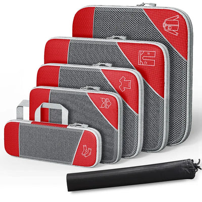 Set of red and gray packing cubes with a black compression bag on a white background