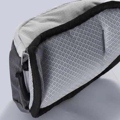 Gray mesh bag with black trim on a light gray background