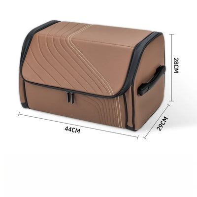 A brown faux-leather storage bag with black trim and white stitching, shown with dimension lines indicating measurements of 44cm, 29cm, and 28cm.