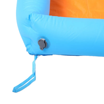 Close-up of an inflatable pool float showing a bright blue inflatable wall with a gray inflation valve and a blue carrying strap, next to an orange interior section, on a white background.