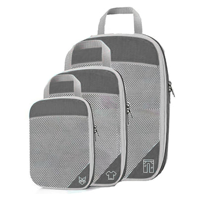 Set of three gray packing cubes with handles on a white background