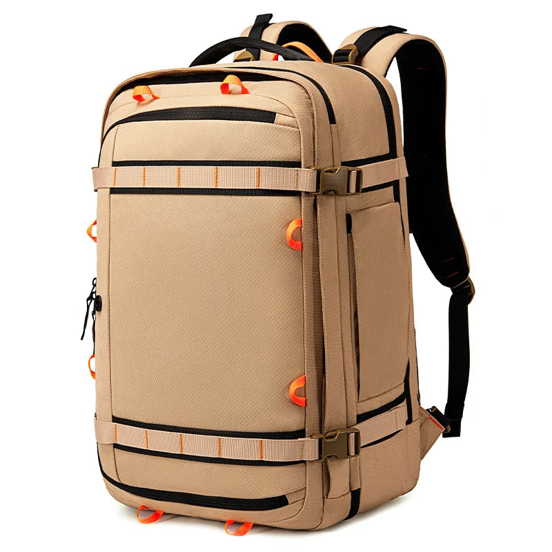A beige tactical backpack with black straps and trim, featuring orange accent loops and zippers, shown on a plain white background.