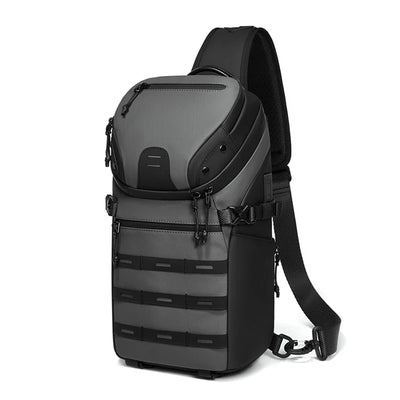 A dark gray and black tactical-style shoulder bag with multiple zippered compartments, MOLLE webbing, and an adjustable shoulder strap, shown on a plain white background.