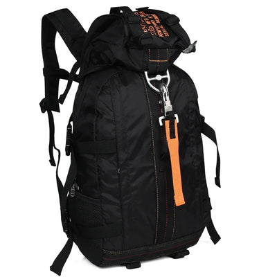 Black backpack with orange accents on a white background