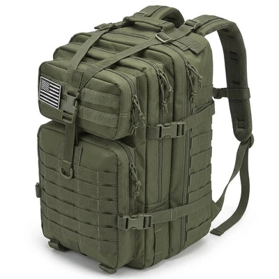 An olive green tactical backpack with multiple zippered compartments, MOLLE webbing, and an American flag patch on the front, shown against a plain white background.