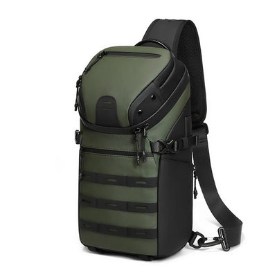 An olive green tactical sling backpack with black accents, shown on a plain white background.