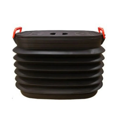 A black collapsible accordion-style storage container with red carrying handles on a plain white background.