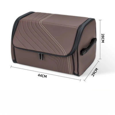 A brown zippered storage bag with black trim and white contrast stitching, shown with dimension lines indicating measurements of 44cm, 29cm, and 28cm.