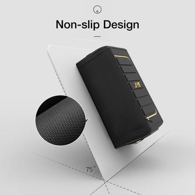 A black portable speaker with gold accent lines and a gold 'JIE' logo, shown at an angle on a white display stand with a circular inset of its textured mesh grille. The image includes the text 'Non-slip Design' at the top.