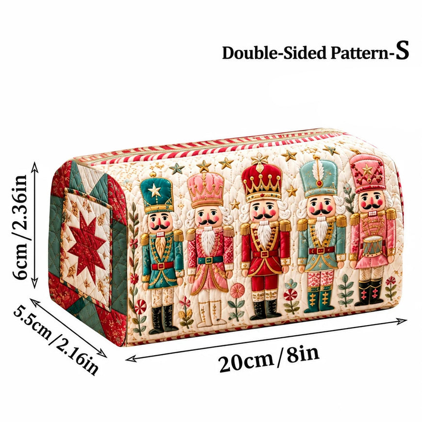 A double-sided patterned fabric napkin or small cover shown with printed dimensions and Arabic/English size labels. The product has a cream background with a row of colorful nutcracker figures and red-and-white striped edges.