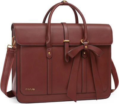 Brown leather bag with a bow on a white background