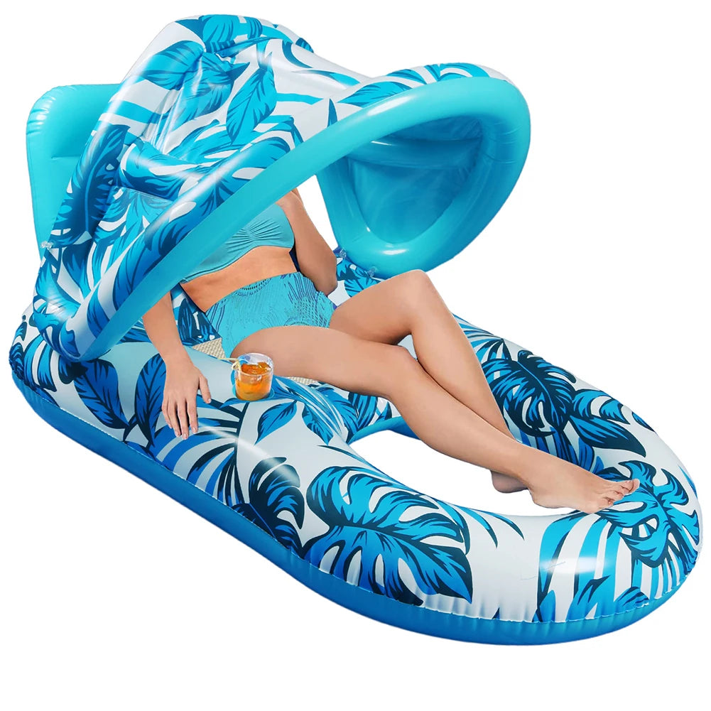 Inflatable lounge chair with blue leaf pattern on a white background