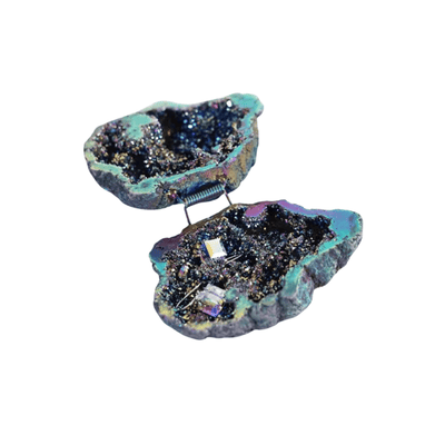 A gothic-style ring box crafted from an open natural geode, featuring a dark, glittery interior with metallic gold crystals and a vibrant iridescent turquoise and purple outer shell, shown on a solid white background.
