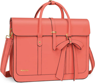 Coral pink handbag with a bow detail on a white background