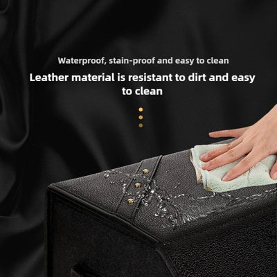 A close-up of a black textured leather surface with water droplets being wiped away by a hand with a cloth. White text above reads 'Waterproof, stain-proof and easy to clean' and 'Leather material is resistant to dirt and easy to clean'.