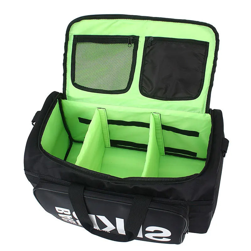 A black duffel bag with a bright neon green interior, shown open to reveal multiple compartments, mesh pockets, and side handles. The bag has large white stylized lettering on the front pocket and is photographed on a clean light gray studio background.