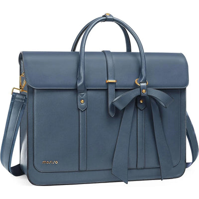 Blue leather bag with a bow on a white background