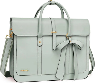 Light blue handbag with a bow detail on a white background