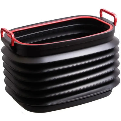 Stack of black inflatable trays with red handles on a white background